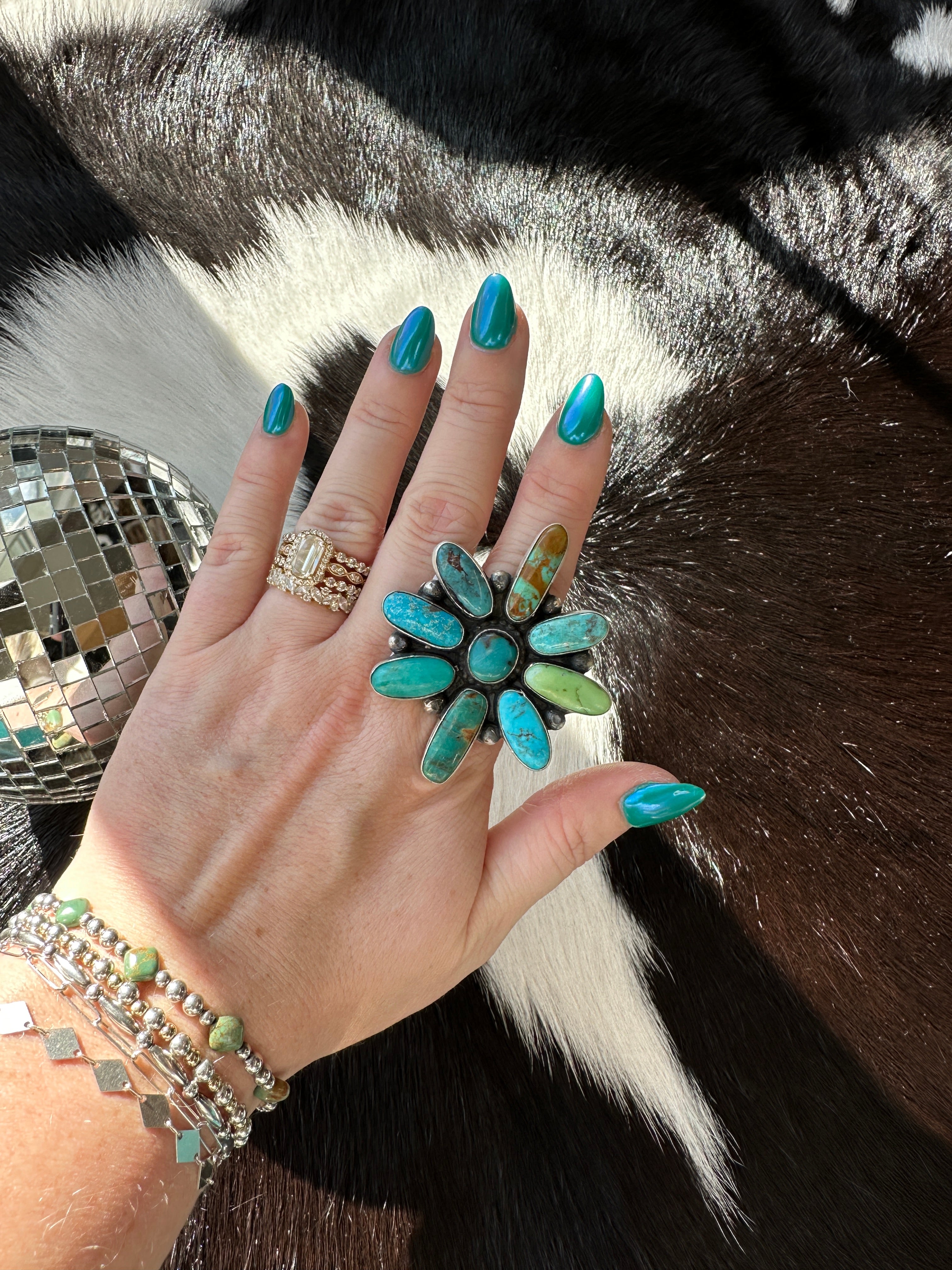 Adjustable statement cluster ring